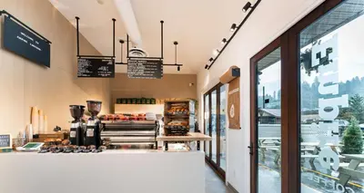 a bakery with a counter in a store at Prestige Lakeside Resort, WorldHotels Elite in Nelson