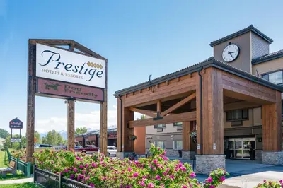 a hotel with a sign in front of a building at Prestige Golden Hotel in Golden