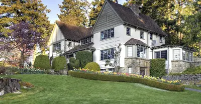 an architectural rendering of a house with a yard at Hastings House Country House Hotel in Ganges