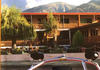 a bike parked in front of a building at Sun Beach Motel in Osoyoos
