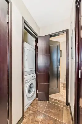 a laundry room with a washer and dryer at Copper Point Resort in Invermere