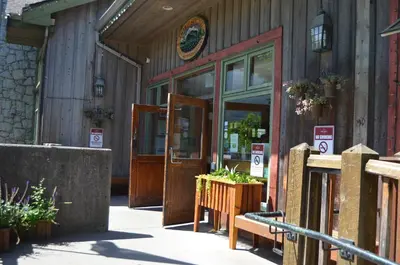 a building with a door and a sign on it at Howe Sound Inn & Brewing Company in Squamish