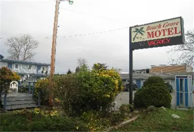 a motel sign in front of a motel at Beach Grove Motel in Tsawwassen