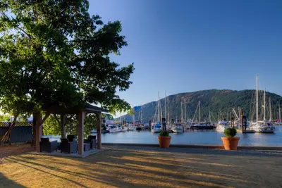 a view of a marina with boats in the water at Oceanfront Suites at Cowichan Bay in Cowichan Bay
