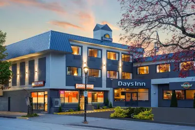 a building with a sign that reads days inn at Days Inn by Wyndham Terrace in Terrace