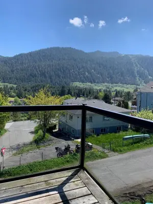 a view from a balcony with a view of a parking lot at Black Rooster Guesthouse in Prince Rupert