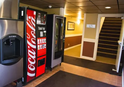 a coca cola vending machine in a building at Days Inn by Wyndham High Level in High Level