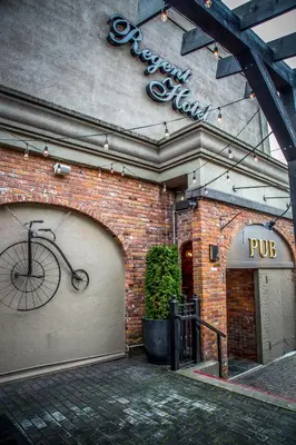 a bicycle on the side of a brick building at Regent Hotel Revelstoke in Revelstoke