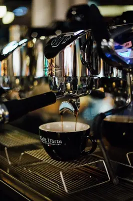 a coffee maker is making a cup of coffee at Pangea Pod Hotel in Whistler