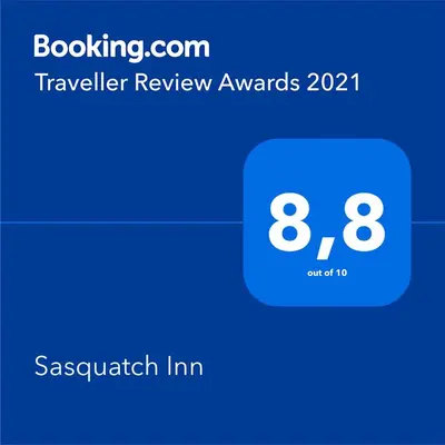 a screenshot of a sasquatch line with the text travelling review awards at Sasquatch Inn in Harrison Mills