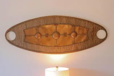 a wooden ceiling with a candle in a room at The Waterfront Suites and Marina in Nanaimo