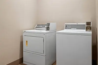 two appliances sitting next to each other in a room at Ramada by Wyndham Drumheller Hotel & Suites in Drumheller