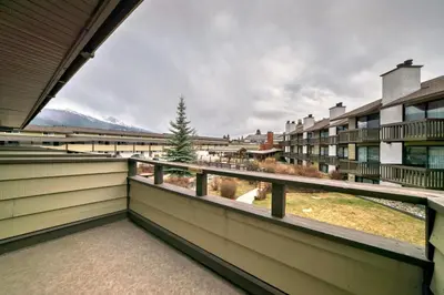 a balcony with a view of the mountains at Jasper Inn & Suites by INNhotels in Jasper