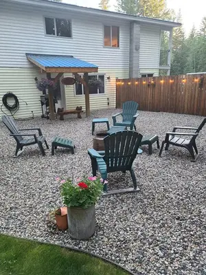 a patio with rocking chairs and a gazebo at Grizzly Paw B&B in Clearwater
