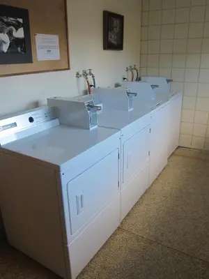 a row of sinks in a bathroom withermottermottermottermott at Rosedale Manor in Duncan