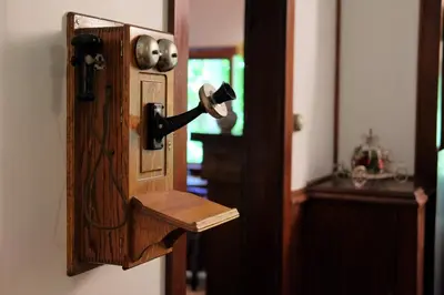an open door with a gun on a wooden handle at Wedgwood Manor and Glamping Retreat in Crawford Bay