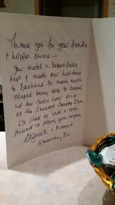 a handwritten letter on a piece of paper at Chinook Country Inn in Sundre