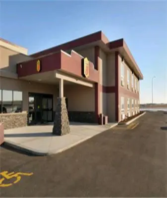 a building on the side of a road at Super 8 by Wyndham Innisfail in Innisfail