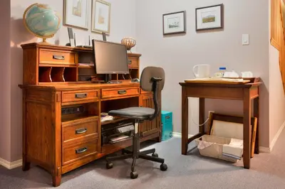 an office with a desk with a computer and a chair at Hummingbird Bed and Breakfast in Clearwater