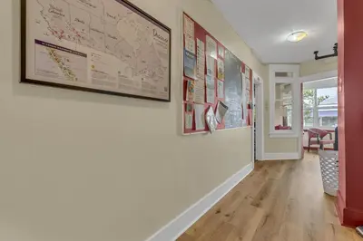 a hallway with a map on the wall at HI Penticton - Hostel in Penticton