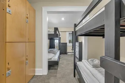 a dorm room with two bunk beds in it at HI Penticton - Hostel in Penticton