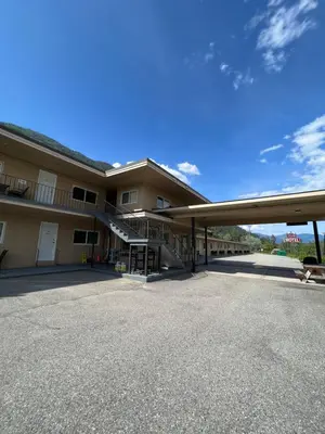 an empty parking lot in front of a building at Villa Motel in Nelson