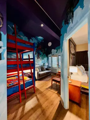a room with a bedroom with a bunk bed at Super 8 by Wyndham Castlegar BC in Castlegar