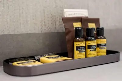 a tray with four bottles of honey and cheese at Best Western Plus Tin Wis Resort in Tofino