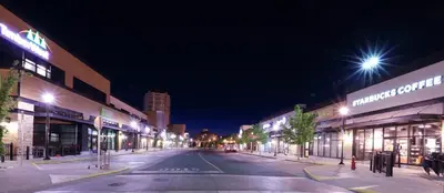 an empty city street at night with buildings at Diplomat Motel in Nanaimo