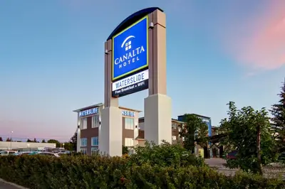 a sign in front of a building at Canalta St.Paul in St. Paul