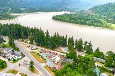 an aerial view of a village next to a river at Richca Chalets Resort in Hope