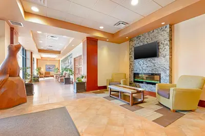 a lobby of a hospital with a waiting room at Best Western Plus Barclay Hotel in Port Alberni