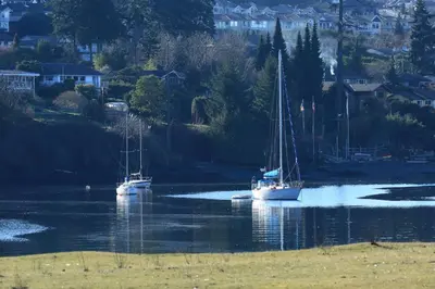 two boats floating on a body of water at Glen Lyon Inn in Port Hardy