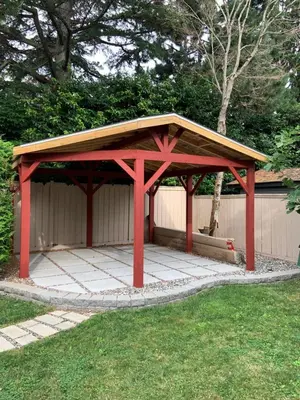 a red gazebo with a roof on the grass at Orchid House near Vancouver YVR Airport in Richmond