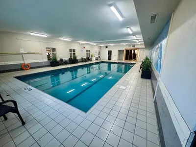 a large swimming pool in a large building at Best Western Mountainview Inn in Golden