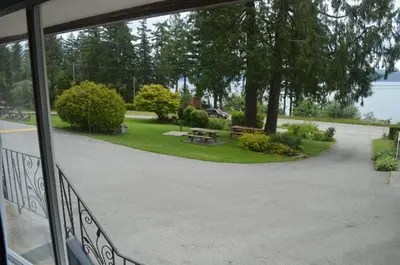 a view of a patio from a window at Seaside Villa Motel & RV Park in Powell River