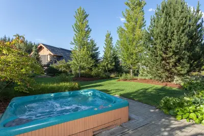 a hot tub in the yard of a house at Montebello by Whistler Premier in Whistler