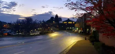 an empty street at night with the sun setting at Painted Turtle Guesthouse in Nanaimo