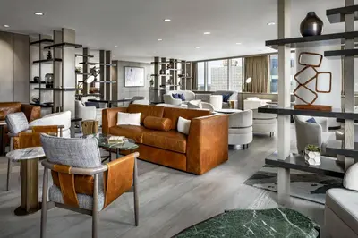 a living room with a couch and chairs at JW Marriott Edmonton ICE District in Edmonton