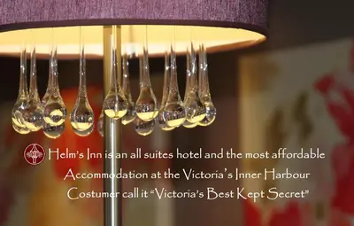 a bunch of forks hanging from a chandelier at Helm's Inn in Victoria