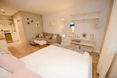 a small room with a bed and a couch at Newly Renovated Whistler Studio in Whistler