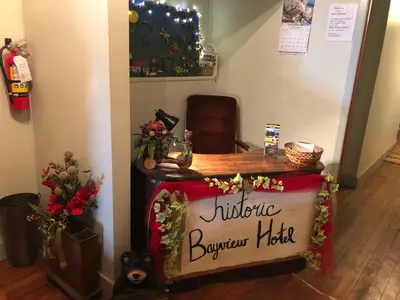 a jubilee banquet table with a sign on it at Historic Hotel Bayview in Stewart