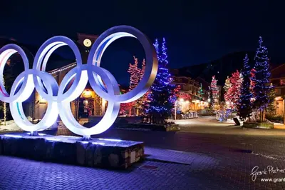 a display of the olympic rings in a city at night at Studio suite located in the heart of Whistler village in Whistler