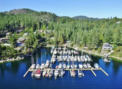 an aerial view of a marina with boats in the water at Pender Harbour Resort & Marina in Garden Bay