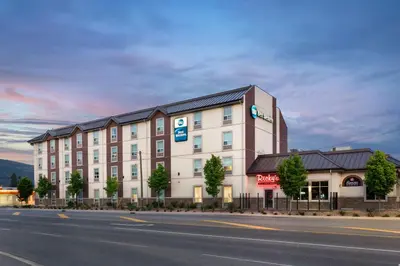 a rendering of a hotel on the side of a road at Best Western Pacific Inn in Vernon