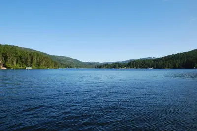 a large body of water with trees in the background at Shawnigan Suite B & B in Shawnigan Lake