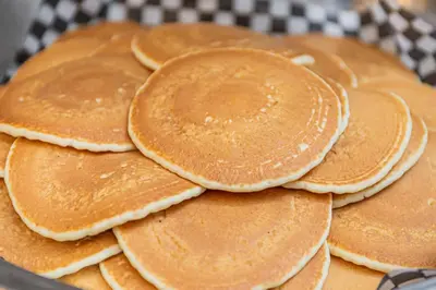 a pile of pancakes sitting on top of a pan at Sheraton Vancouver Guildford Hotel in Surrey