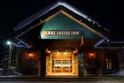 a lake house inn sign on the front of a building at Lake Louise Inn in Lake Louise