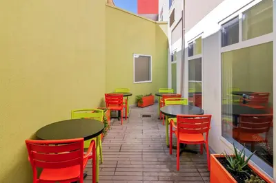 a row of tables and chairs in a restaurant at Best Western Plus Osoyoos Hotel & Suites in Osoyoos