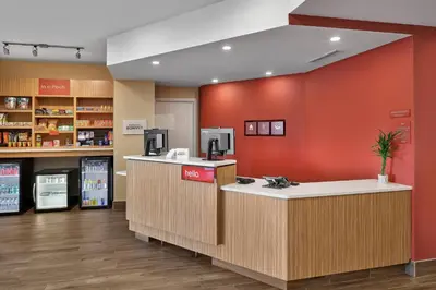 a lobby of a store with a cash register and a pharmacy at TownePlace Suites by Marriott Edmonton Sherwood Park in Sherwood Park